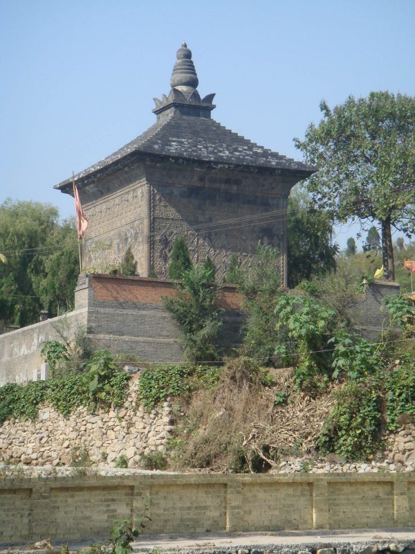 Cube pagoda with a triangular roof covered with ceramic tiles