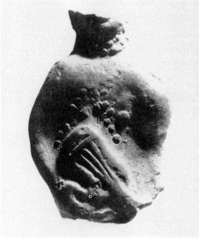 damage statue of figure playing a Lute