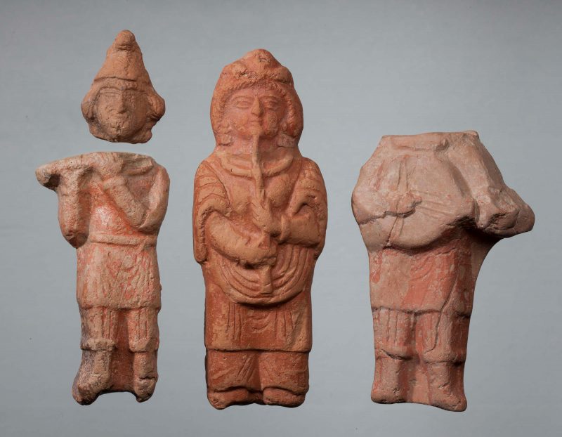 Three figurines of musicians