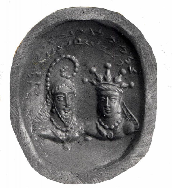 oval seal impression with two crowned figures under inscription