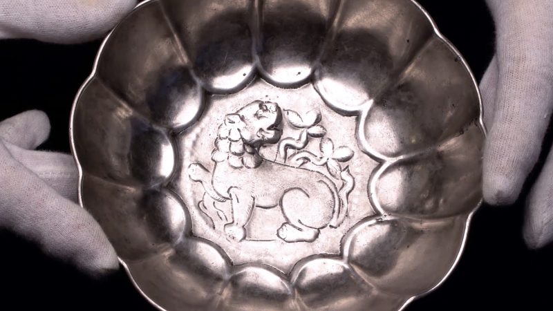 A Sogdian lobed bowl with a lion motif is discussed as an example of Sogdian metalwork